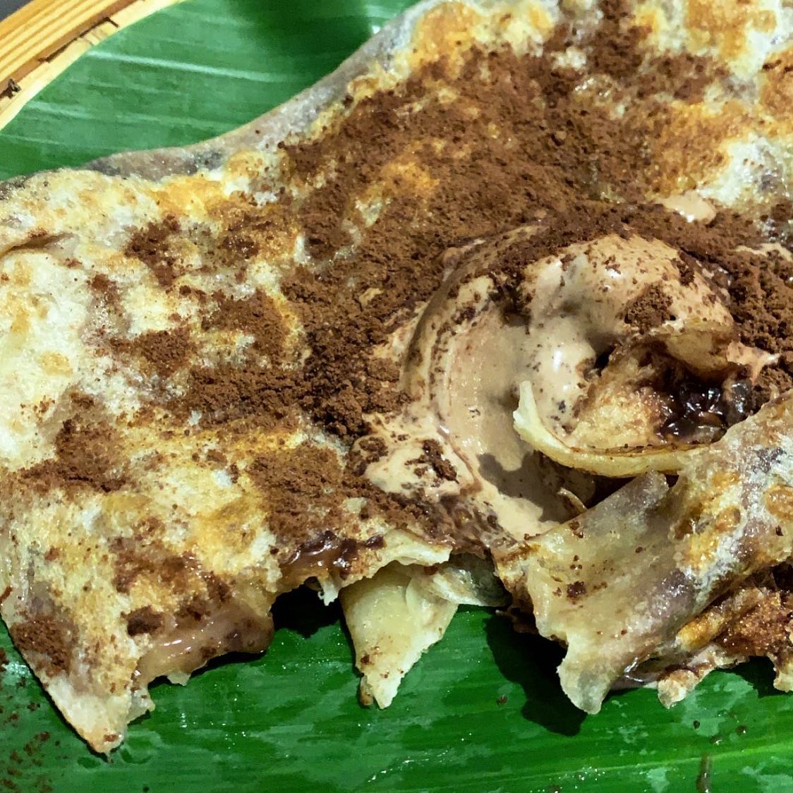 Roti canai Milo tabur dengan serbuk Milo